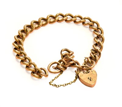 Lot 188 - A fancy curb link bracelet, with a 9 carat...