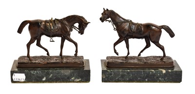 Lot 61 - A pair of patinated metal horse models on...
