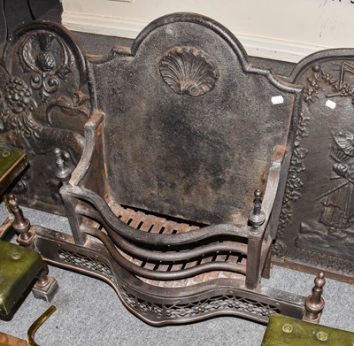 Lot 1132 - A George III style fire grate, with shell cast...