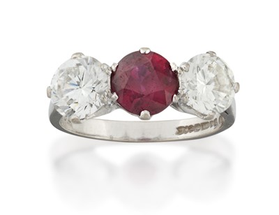 Lot 2283 - An 18 Carat White Gold Ruby and Diamond Three Stone Ring