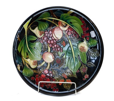 Lot 13 - A Modern Moorcroft pottery charger in the...