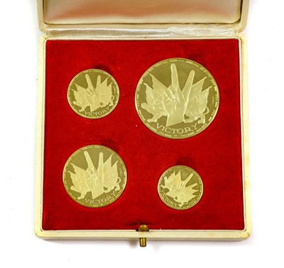 Lot 365 - A Cased Set of Four Gold Churchill Victory...