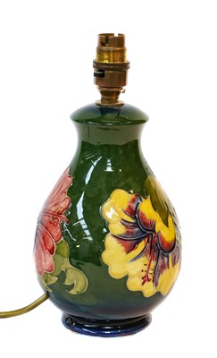 Lot 18 - A Walter Moorcroft pottery table lamp in...