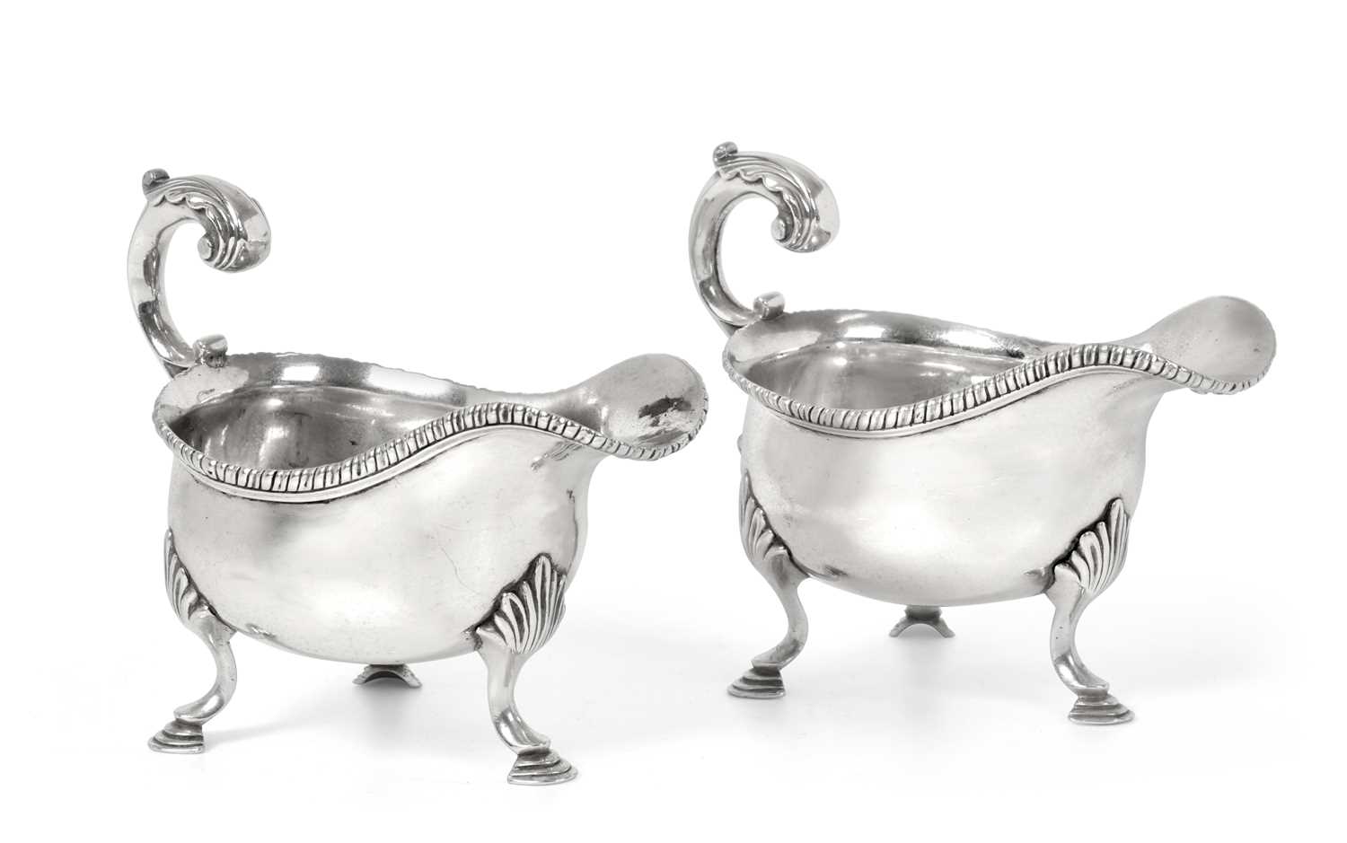 Lot 2010 - A Pair of George III Silver Sauceboats, by...