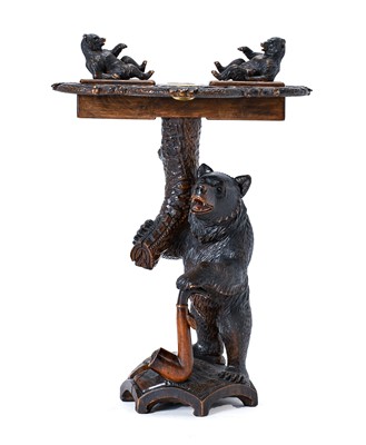 Lot 665 - A Rare Black Forest Carved Smoker'sTripod...