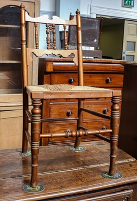 Lot 1240 - An early 20th-century walnut child's chair...