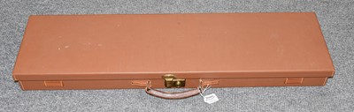 Lot 366 - A Powell & Son tan leather-covered gun case...