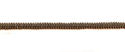 Lot 296 - A 9 carat gold diamond bracelet, length 20cm