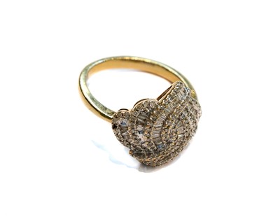 Lot 211 - A 9 carat gold diamond cluster ring, finger...