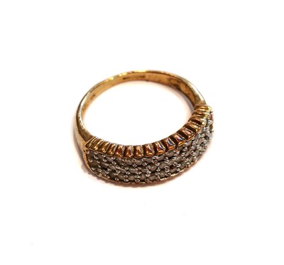 Lot 297 - A 9 carat gold diamond half hoop ring, finger...