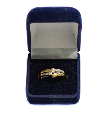 Lot 200 - A 9 carat gold diamond two stone ring, finger...