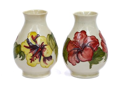 Lot 338 - A pair of Moorcroft pottery Hibiscus pattern...