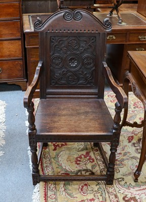 Lot 1099 - A pair of 20th century oak Wainscott's armchairs