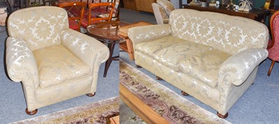 Lot 1128 - A three-piece suite comprising, a sofa and two...