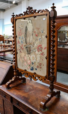 Lot 1084 - A Victorian firescreen, a good example with...