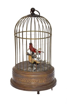 Lot 306 - An automaton singing birdcage