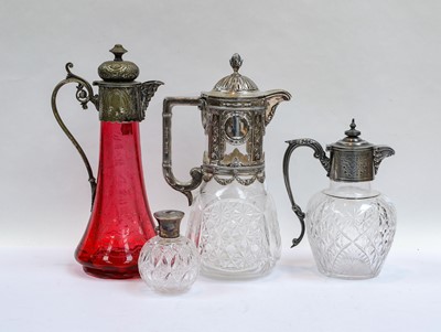 Lot 45 - A Victorian cranberry glass claret jug with...