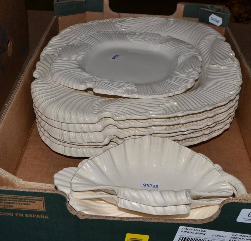 Lot 656 - Modern Leeds creamware comprising six large plates, two shell dishes, two leaf dishes and a...