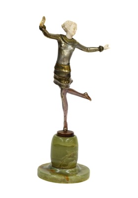 Lot 345 - An ivory and cold painted bronze figure, by...