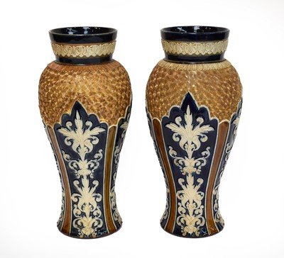 Lot 134 - A pair of Royal Doulton stoneware vases with...