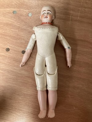 Lot 359 - Bisque shoulder head doll with sleeping eyes,...