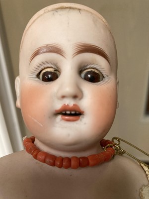 Lot 359 - Bisque shoulder head doll with sleeping eyes,...