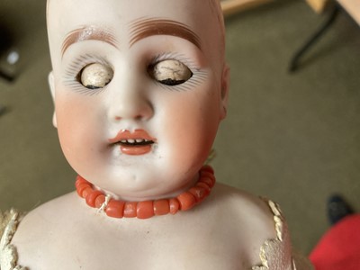 Lot 359 - Bisque shoulder head doll with sleeping eyes,...