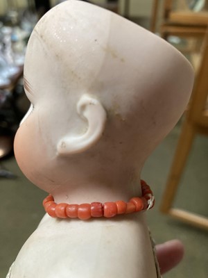 Lot 359 - Bisque shoulder head doll with sleeping eyes,...