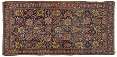 Lot 1093 - Good Senneh Region Khelleh Persian Kurdistan The deep indigo abrashed field with an allover lattice