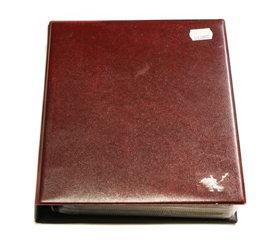 Lot 251 - A red album containing approx.. 92 postcards...