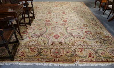 Lot 1100 - Indian carpet, the pale corn field of large...