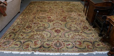 Lot 1101 - Indian carpet, the pale corn field of large...