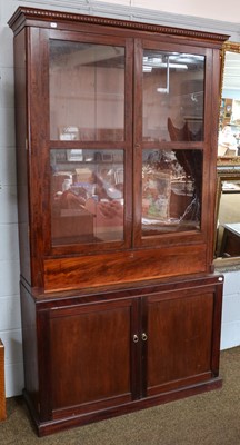 Lot 1202 - A mahogany bookcase, part 19th century, with...
