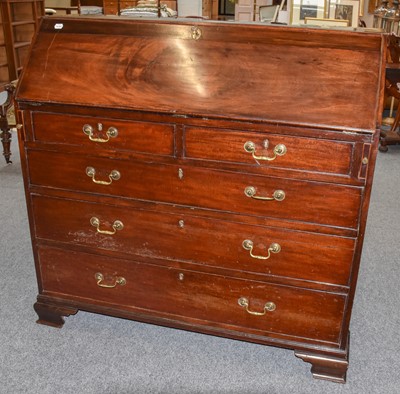 Lot 1242 - A George III mahogany bureau, late 18th...