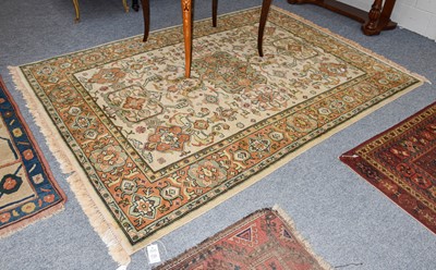 Lot 1018 - An Indian rug the pale wheat field of...