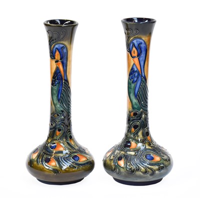 Lot 357 - A pair of modern Moorcroft bottle vases in the...
