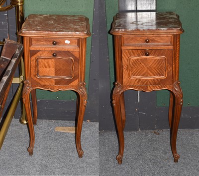 Lot 1147 - A pair of reproduction French marble topped...