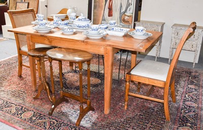 Lot 1188 - A modern extending dining table, 171cm by 90cm...