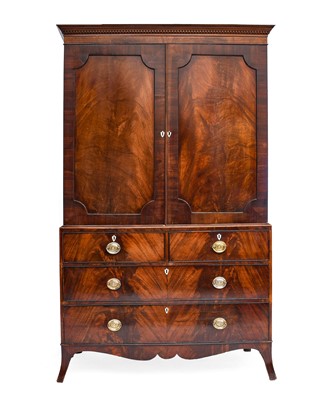 Lot 606 - A George III Mahogany Linen Press, circa 1800,...