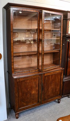 Lot 1063 - A George III mahogany bookcase with glazed...