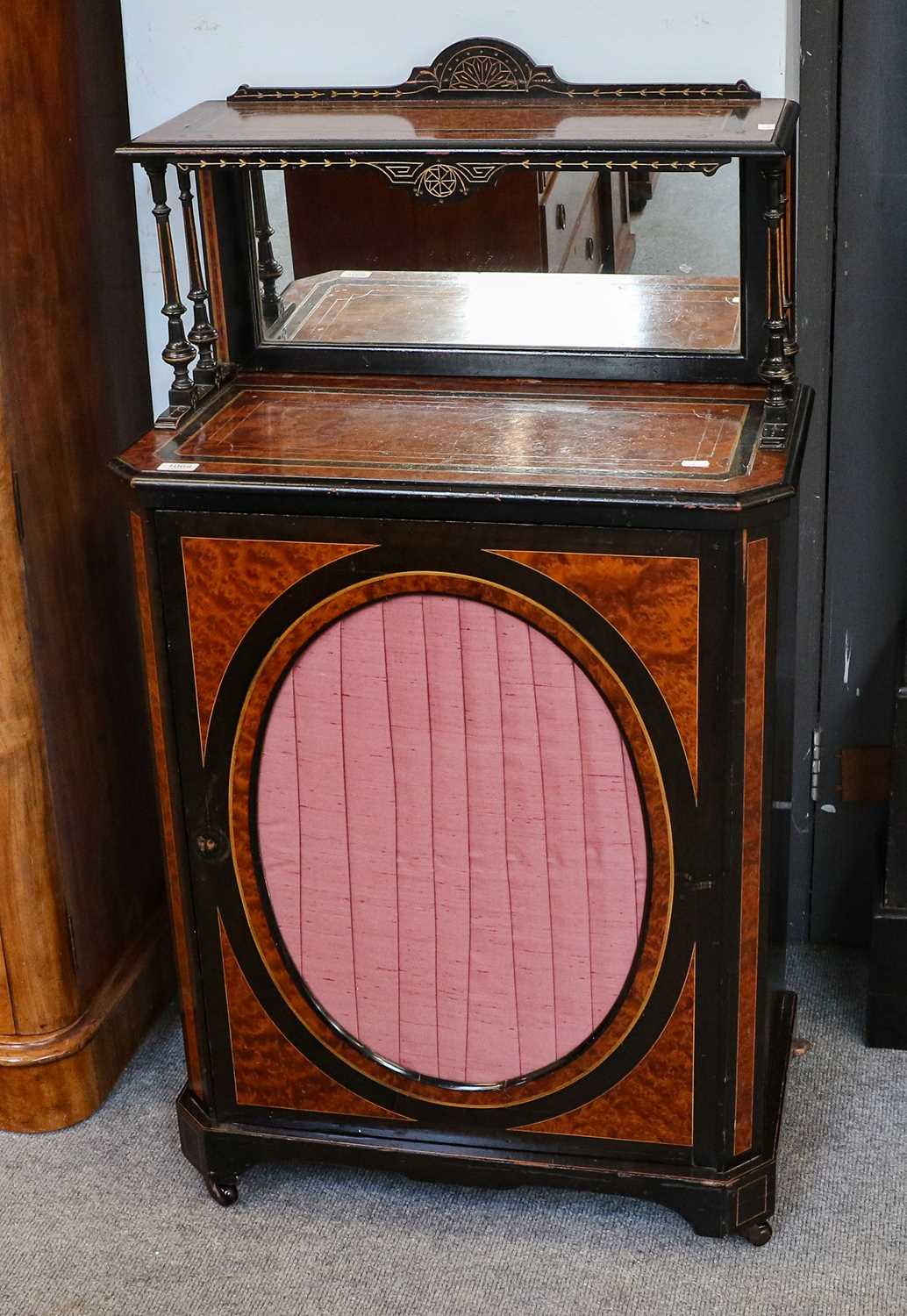 Lot 1068 - A 19th century part ebonised parcel-gilt