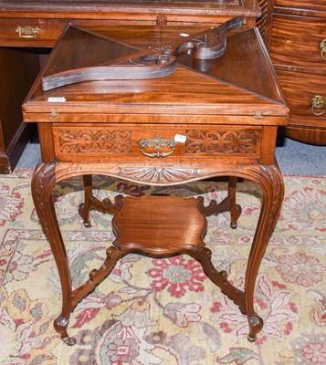 Lot 1194 - A 20th century mahogany envelope card table...