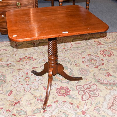 Lot 1195 - A 19th century tilt top tripod table with a...