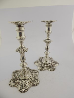 Lot 2101 - A Pair of George IV Silver Candlesticks