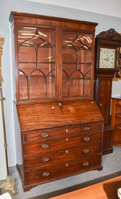 Lot 1267 - A good Georgian mahogany bureau bookcase, the...