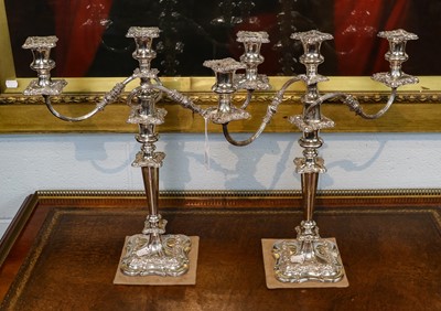 Lot 102 - A Pair of Silver Plated Three-Light Candelabra,...