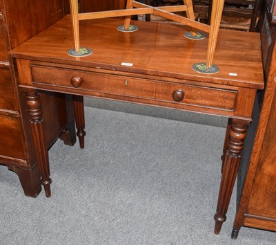 Lot 1226 - A William IV mahogany side table, fitted with...