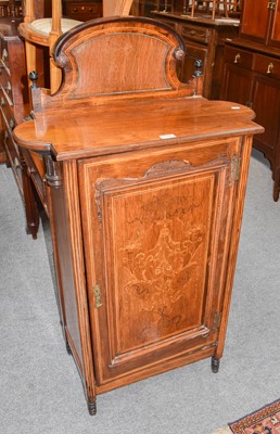 Lot 1225 - An Edwardian inlaid mahogany music cabinet,...