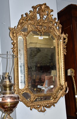 Lot 1269 - A 19th-century sectional mirror the bevelled...