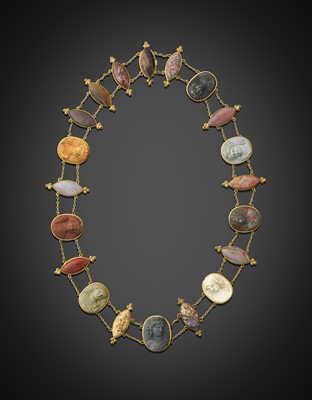 Lot 2320 - A Hardstone and Lava Cameo Necklace